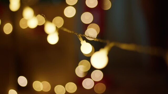 Shiny christmas lights hanging background 