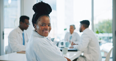 Portrait, black woman and doctors in a meeting, smile and healthcare with planning, hospital and teamwork. Face, professional and group with management staff, conversation and talking with medicare - obrazy, fototapety, plakaty
