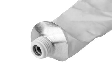 Opened tin tube isolated on white background.