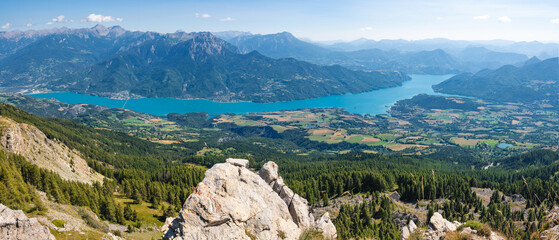 Serre-Poncon Lake in Summer from Ecrins National Park (Chabrieres Needles). Hautes-Alpes...