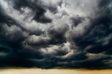 Dark storm cloud covers the sky