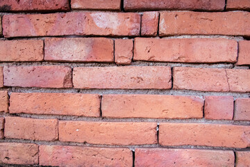 Obraz premium Red brick walls are neatly stacked, beautiful and natural to an ancient construction site.