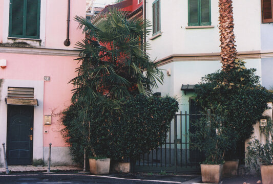 Pink, Red and Green Old Houses in Milano Old Town, Italy. Colorful Ancient Village. Film Photography