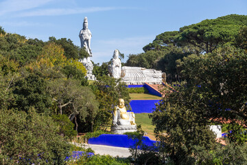 buddha statues in the famous Bacalhoa Buddha Eden Garden in Portugal