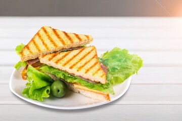 Tasty fresh sandwich with ham and cheese