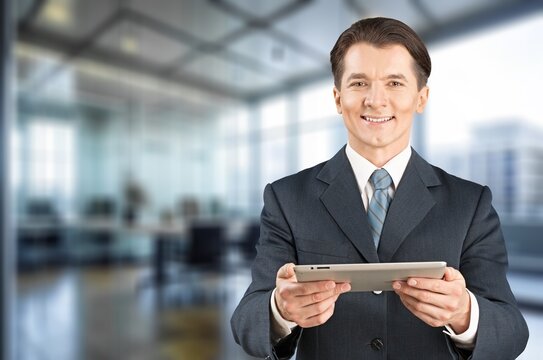 Happy business man using tablet computer, AI generated image