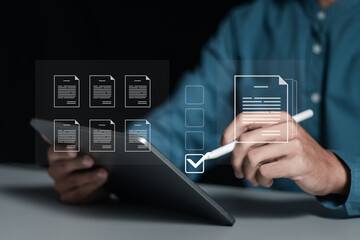 Businessman working on tablet to document management online for checklist and clipboard task management, filling survey form online, answer questions of test. Survey form concept.