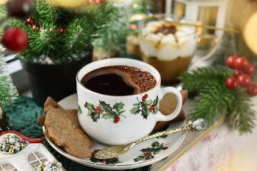 Christmas coffee gingerbread cookies and tiramisu dessert on windowsill