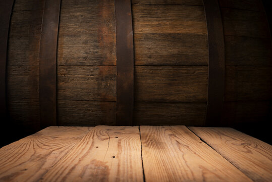 image of wooden table in front of abstract blurred background of resturant lights . High quality photo