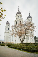Fototapeta na wymiar Vertical shot of a white building of Metropolitan Cathedral, Iasi, Romania