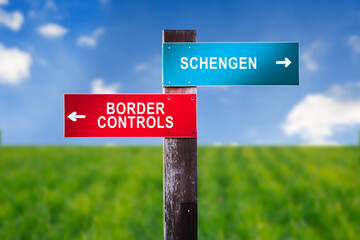 Schengen versus Border Controls - Road sign with two options.