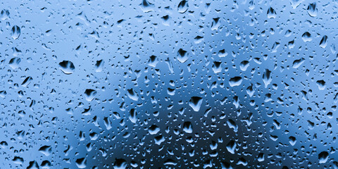 large and fine water drops on glass. banner for website, long wide banner.