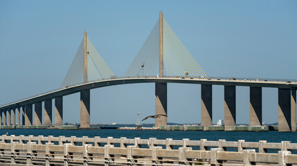 Sunshine Skyway Bridge over Tampa Bay in Florida with moving traffic. Concept of transportation infrastructure