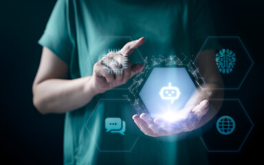 Woman hands working on computer and data theme hologram HUD. Tech concept. Ai hologram with digital human head on dark background. Machine learning, artificial intelligence and conversation assistant.