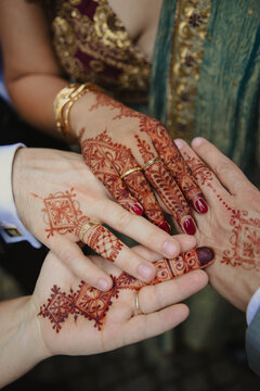 henna on hands at an indian wedding 