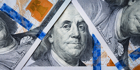 Dolar USA close up. Benjamin Franklin's eyes from a hundred-dollar bill . The texture of the...