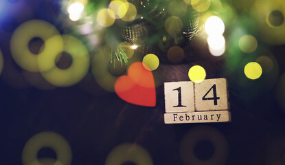 Wood cubes with 14 February date calendar. concept of Saint Valentine's.