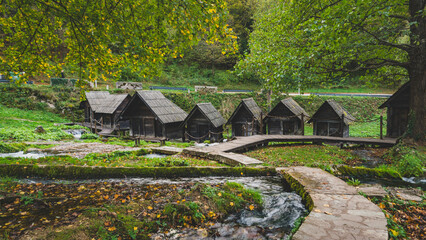 Beautiful small woode watermills in the middle of the forest, Mlincic, Bosnia and  Herzegovina