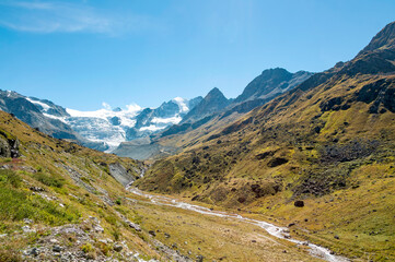 Anniviers valley in the Swiss Alps in summer with the Moiry glacier in the background - 677738371