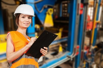 Young engineer on factory, work checking up process