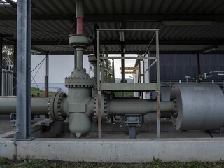 Fototapeta na wymiar Closeup of biogas pipes in an isolated area