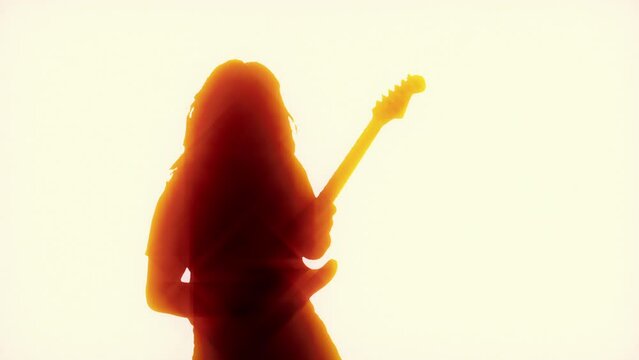 Heavy Metal Guitarist Backlit On Stage
