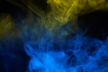 Yellow steam on a black background.