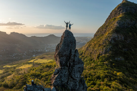 Aerial view of people climbing on Piton Jacob Peak mountain in Port Louis, Mauritius.