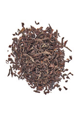 Dry black tea leaves, isolated on white background.