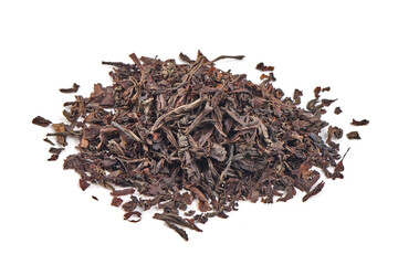 Dry black tea leaves, isolated on white background.