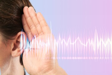Hearing loss. Man ear and sound waves