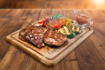 Grilled steak medium rare hot beef.