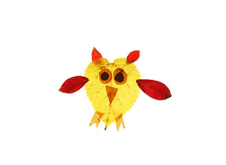 Cute owl made of assorted Fall leaves, isolated on white
