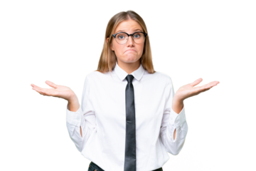 Young business caucasian woman over isolated background having doubts while raising hands