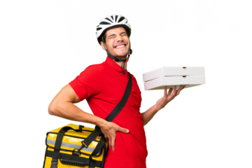 Pizza delivery man with work uniform picking up pizza boxes over isolated background suffering from backache for having made an effort