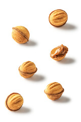 Walnut shaped cookies oreshki with boiled condensed milk with shadows png on transparent background isolated. Traditional christmas cookies oreshki