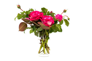 a bouquet of various red roses with green leaves in a vase isolated on white