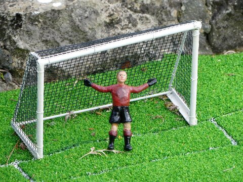 Miniature goalkeeper in goalmouth at Bekonscot Model Village in Beaconsfield, Buckinghamshire