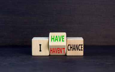 I have or not chance symbol. Concept word I have or have not chance on beautiful wooden cubes. Beautiful black table black background. Business and i have or not chance concept. Copy space.