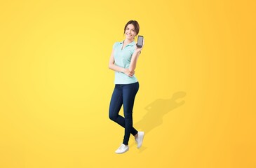 Fototapeta na wymiar Happy young woman hold mobile phone