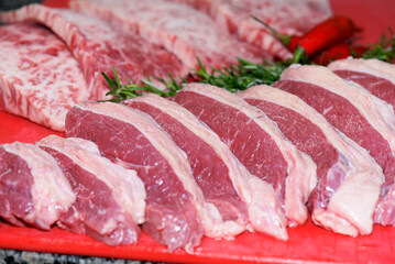 raw meat cut into slices with fat barbecue sliced ​​picanha