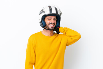 Young caucasian man with a motorcycle helmet isolated on white background laughing