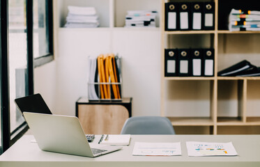 Business Financing Accounting Banking Concept, businessman using smart phone and doing finances, calculate about cost to real estate investment and in other, tax system.