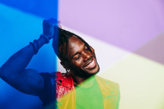 handsome man wearing red leather jacket portrait. Futuristic cyberpunk fashion style - Powered by Adobe