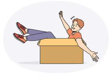 Smiling boy have fun sitting in cardboard box. Happy young man in carton package excited about moving or relocation. Vector illustration.