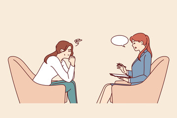 Woman consults psychologist to get rid of mental problems, sits in chair opposite psychotherapist. Upset girl with depression arising from unsuccessful romantic relationship visits psychologist