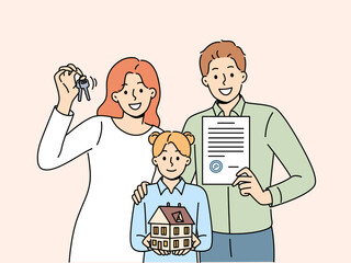 Happy family parents and daughters are holding keys and model of house urging them to take out mortgage from bank. Positive spouses became owners of own real estate thanks to profitable mortgage loan