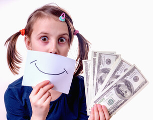 Conceptual image of young girl holding US Dollar money and banner with fake smile as symbol: money...