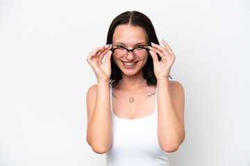 Young caucasian woman isolated on white background With glasses with happy expression