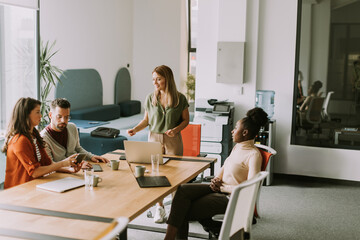Young multiethnic startup team working in the modern office